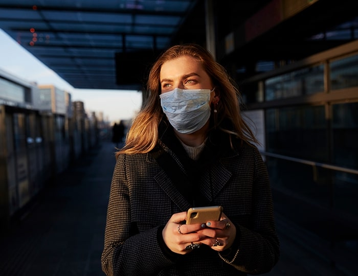 Young woman at railway station 