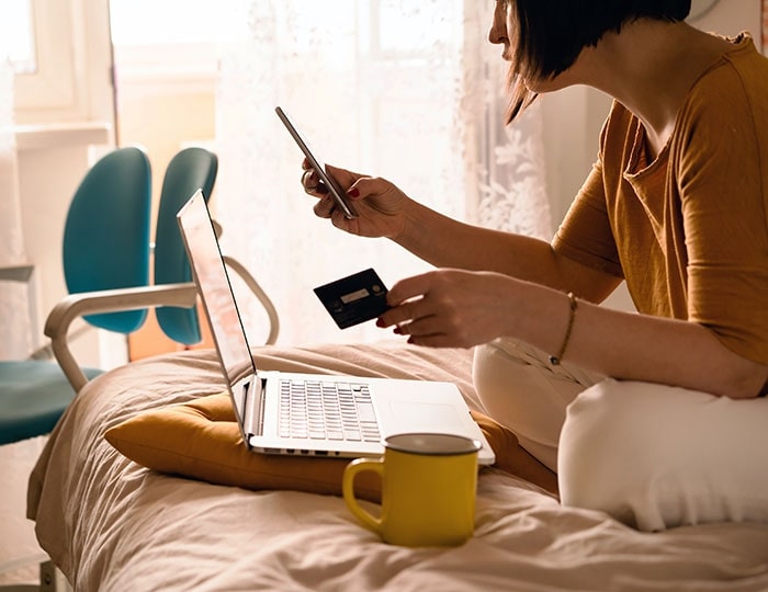 Woman using credit cards