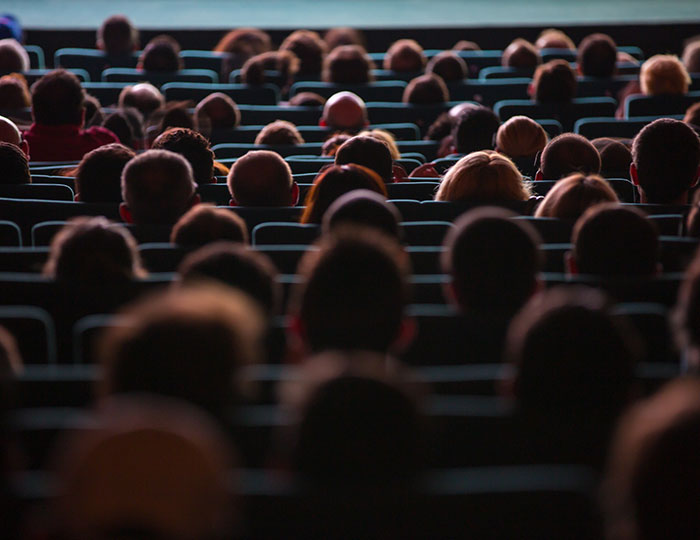 Watching a film in cinema