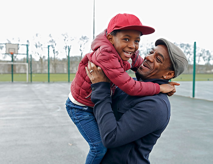 Father and son in park